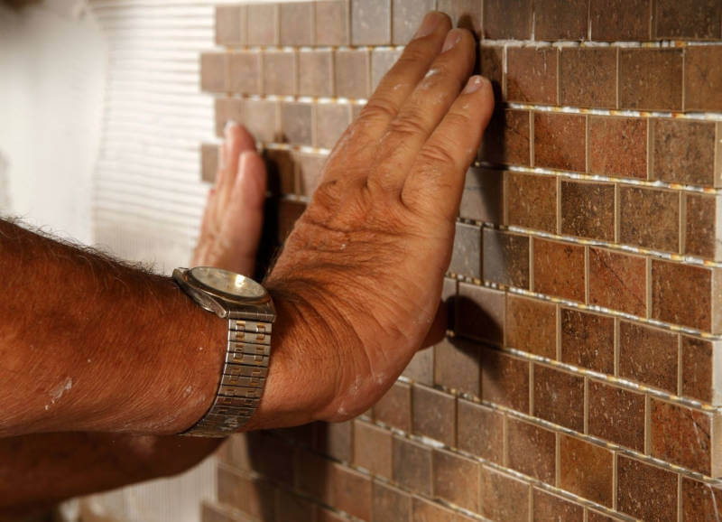 How Do You Cover A Brick Backsplash?